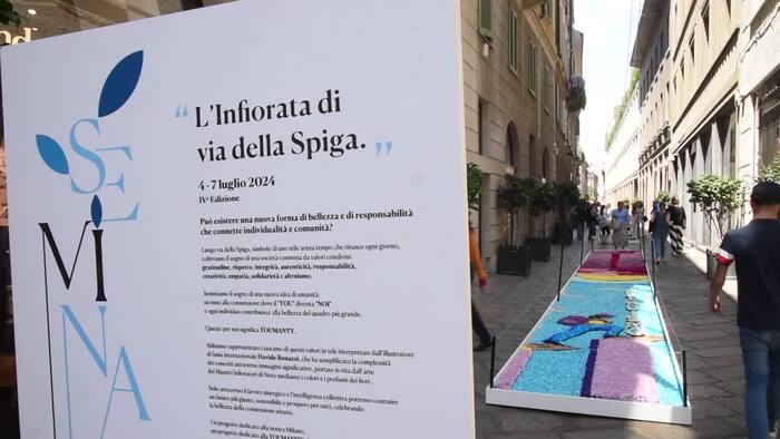Milano, via della Spiga si colora con l’infiorata